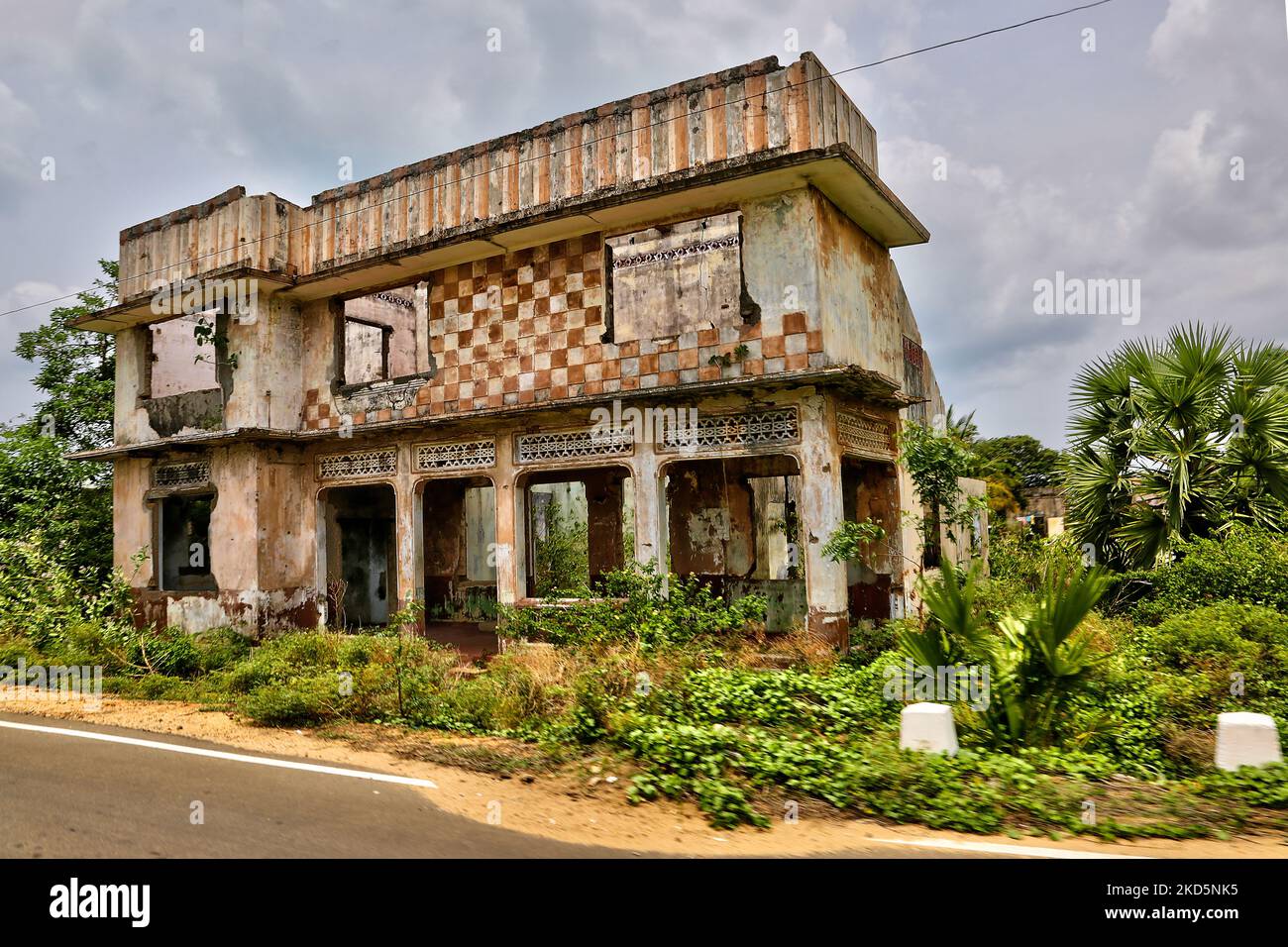 Remains of a house that was destroyed during the Mullivaikkal Massacre in the final battle of the 26-year long civil war between the Sri Lankan Army and the LTTE (Liberation Tigers of Tamil Eelam) in Mullivaikkal, Mullaitivu, Sri Lanka. The Mullivaikkal Massacre was the mass killing of tens of thousands of Sri Lankan Tamils in 2009 during the final stages of the Sri Lankan Civil War ending in May 2009 in Mullivaikkal. The village of Mullivaikkal was completely destroyed. (Photo by Creative Touch Imaging Ltd./NurPhoto) Stock Photo