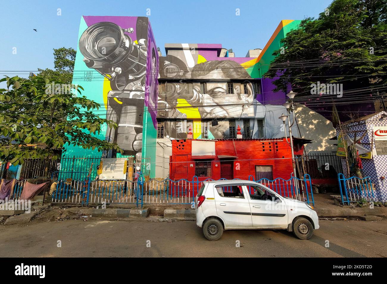 A Wall art honoring film maker and Oscar winner Satyajit Ray is seen at a side of a building in Kolkata , India , on 22 March 2022 . (Photo by Debarchan Chatterjee/NurPhoto) Stock Photo
