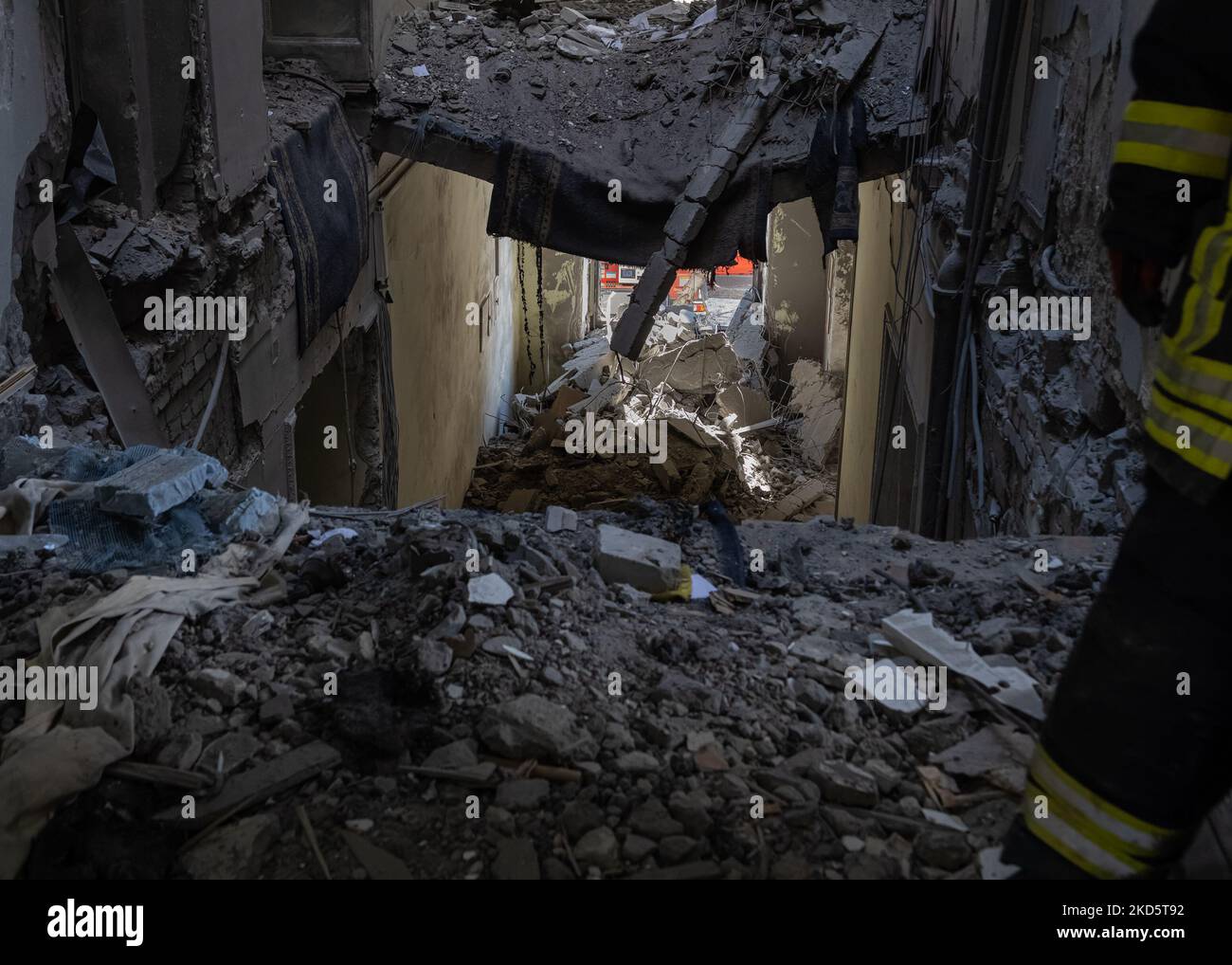 Inside the Kharkiv Oblast Administrative Building, on March 18, 2022. Ruins in and around the Kharkiv Oblast Administrative Building, which was hit by a Russian 3M-54 Kalibr cruise missile on Mar. 1, 2022. Between nine and 11 people were likely killed, with upwards of 40 injured. A hand of one unknown victim that was found in the ruble. According to Kharkiv mayor Ihor Terekhov, three children were killed in the blast. (Photo by Collin Mayfield/NurPhoto) Stock Photo