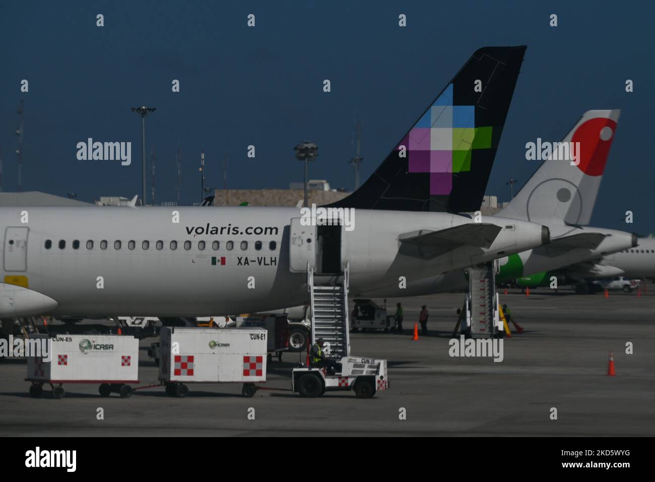 Viva Aerobus and Volaris Airline planes seen at Cancun International