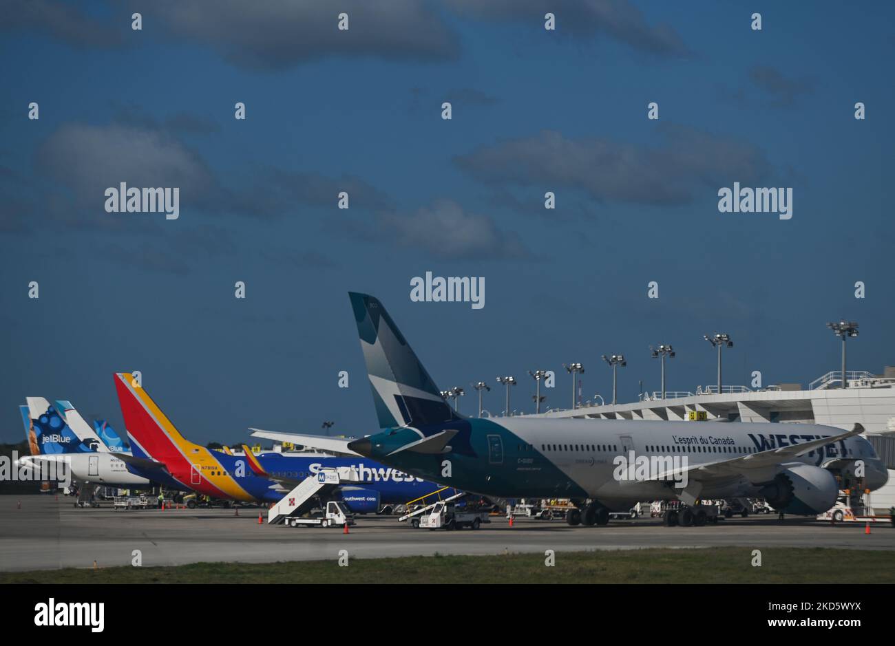 WestJet Airline and Southwest Airlines planes seen at Cancun International Airport. On Wednesday, 23 March 2022, in Cancun International Airport, Cancun, Quintana Roo, Mexico. (Photo by Artur Widak/NurPhoto) Stock Photo