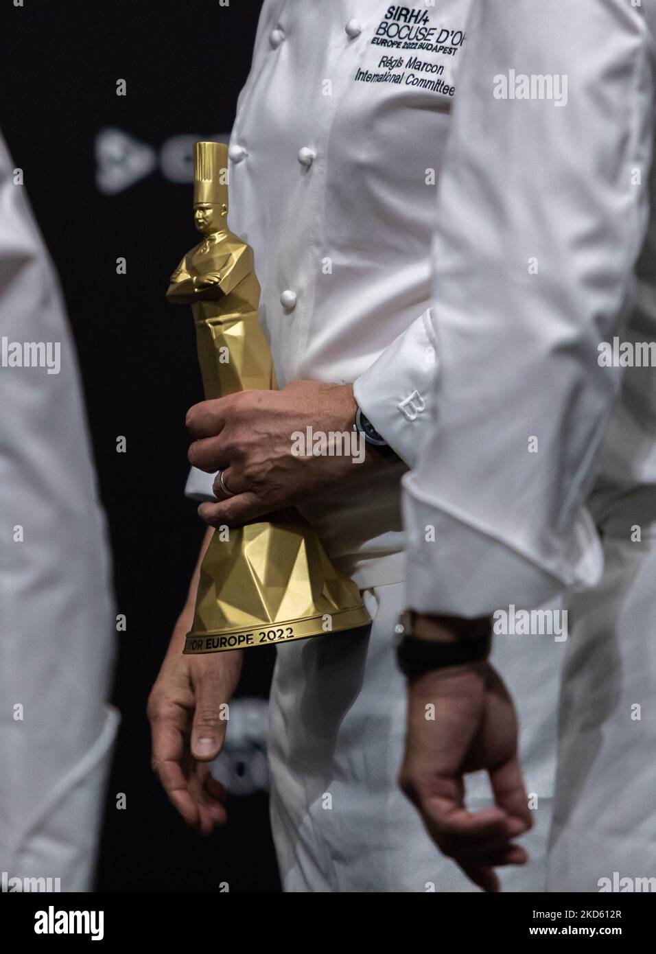 Chef Régis Marcon as a three stars by the Guide Michelin owner hold the trophy during award ceremony on the podium on the Bocuse d’Or Europe 2022 - Day 2 on March 24, 2022 at Hungexpo in Budapest, Hungary. (Photo by Robert Szaniszló/NurPhoto) Stock Photo