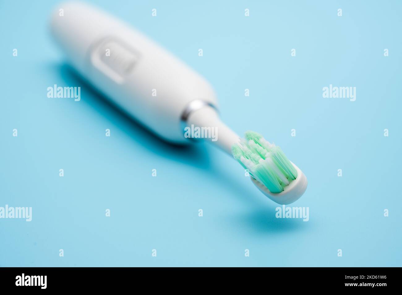 Electric ultrasonic toothbrush to remove dental calculus Stock Photo