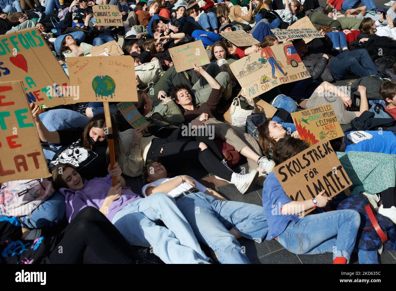Protesters made a die in to symbolize their future if nothing is done to tackle the climate crisis and environmental crisis. Following the call of Greta Thunberg for a World School Strike and 'Fridays for future', school students and students took to the streets of Toulouse to denounce the governments inaction towards the climate crisis even after the 6th IPCC assement report. The window to keep the temperature under +1.5°C is rapidly closing as precised in the IPCC report. They also denounce the lack of action against the environment crisis. Demonstrations were planned in more than 3,100 loca Stock Photo