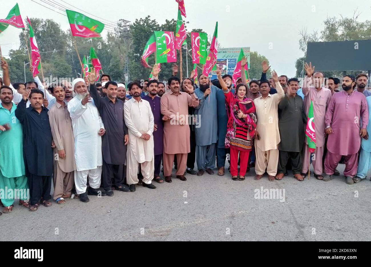 Members of Tehreek-e-Insaf (PTI) are holding protest demonstration against assassination attempt on Imran Khan, PTI Chairman during Long March in Wazirabad, held in Sukkur on Saturday, November 05, 2022. Stock Photo