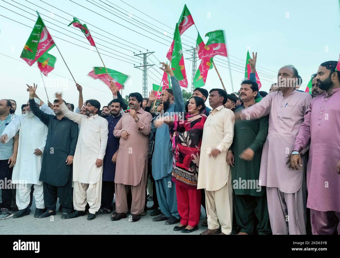 Members of Tehreek-e-Insaf (PTI) are holding protest demonstration against assassination attempt on Imran Khan, PTI Chairman during Long March in Wazirabad, held in Sukkur on Saturday, November 05, 2022. Stock Photo