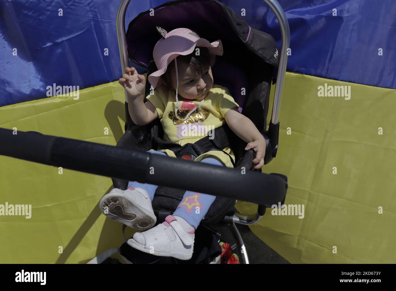 Pram Rts A girl from the Ukrainian community on a pram in Mexico City, in front ...