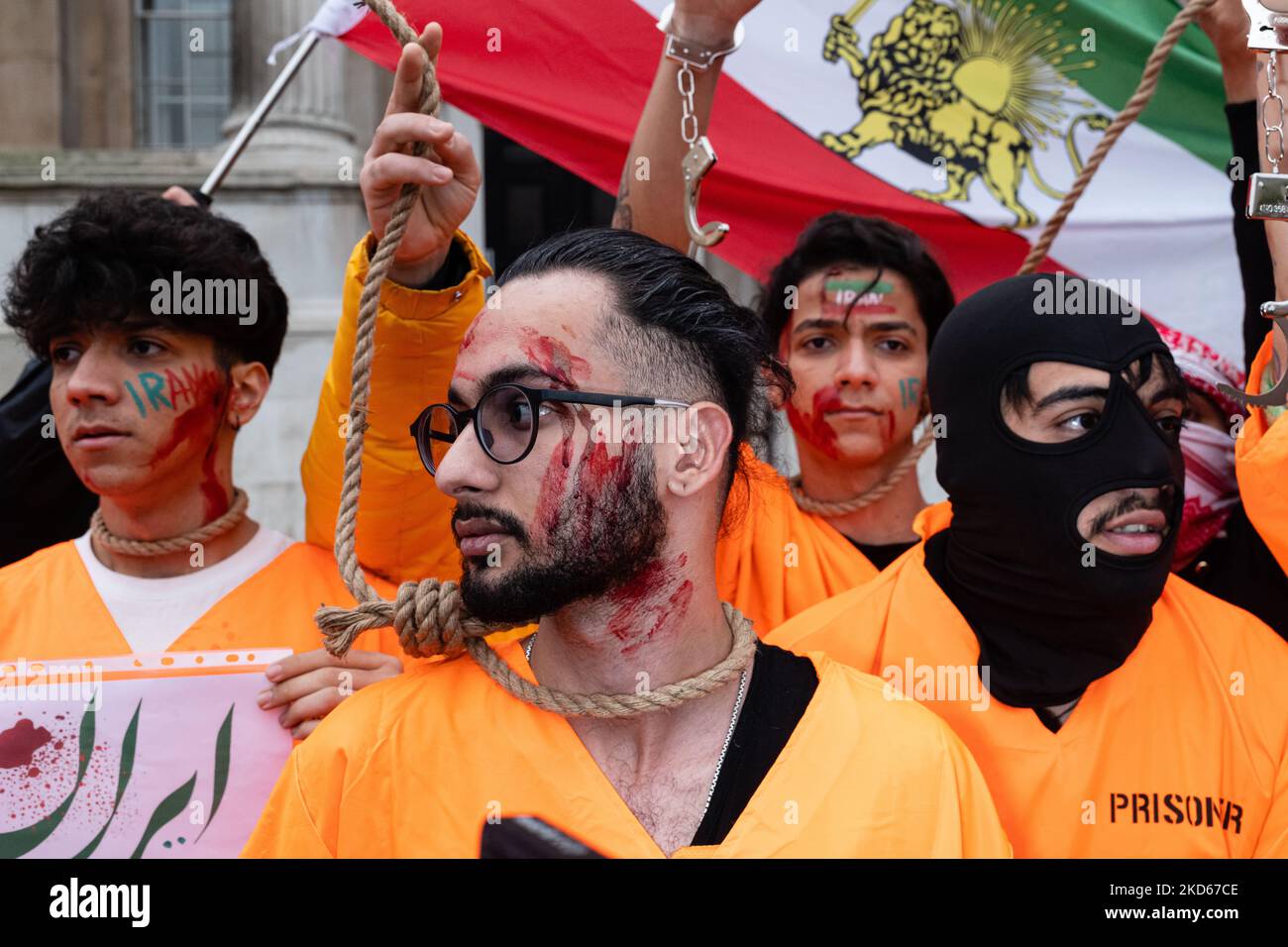 London, UK. 5th November 2022. Protestors recreate scenes of Prisoner Abuse and execution by the Iranian Regime. Stock Photo