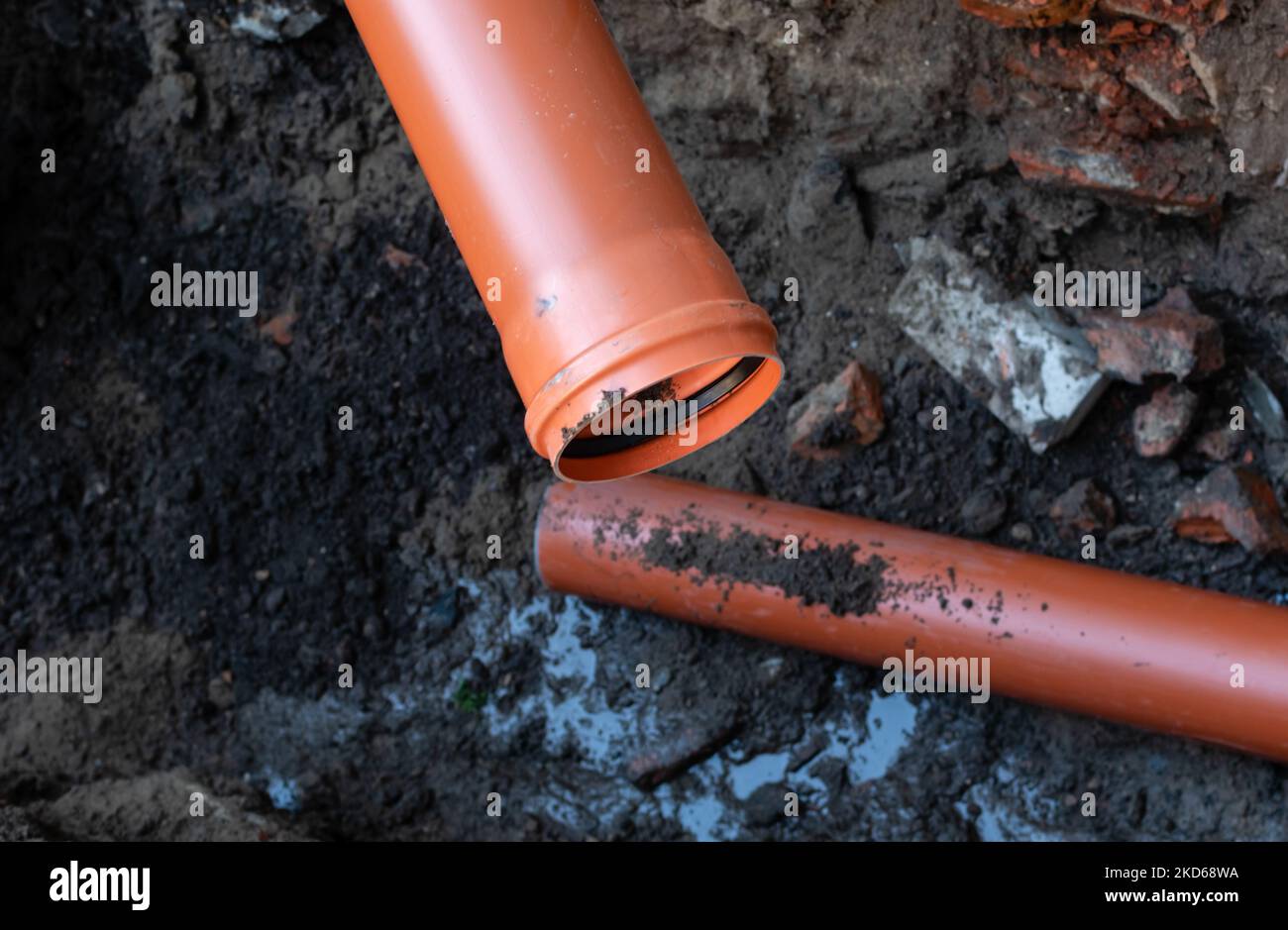 Repair of sewer drain with strong plastic pipe of large diameter in