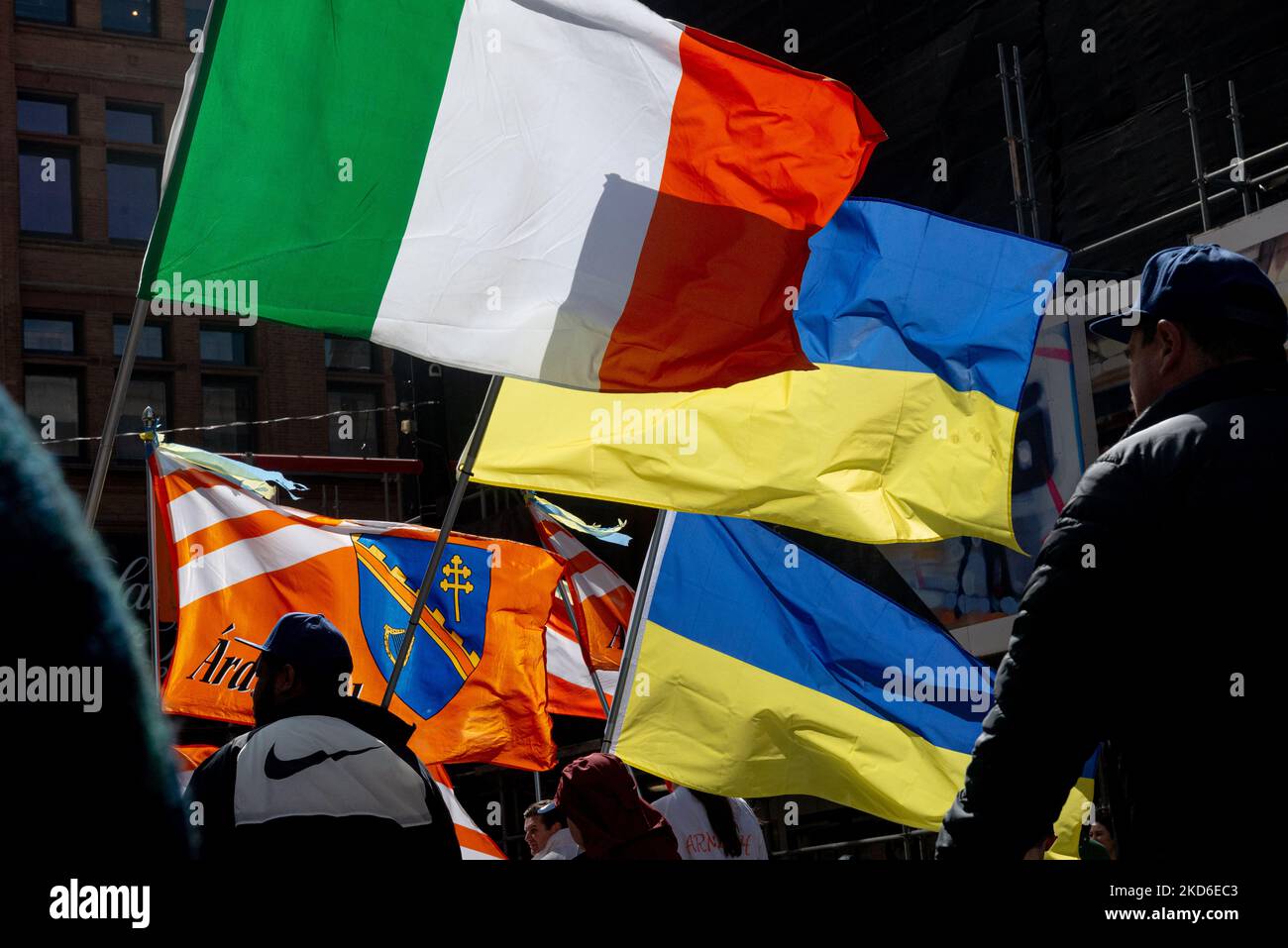 Toronto, ON, Canada – March 20, 2022: Irish community present ukrainian flag during the St Patrick's Day Parade in Downtown Toronto to support Ukraine against Russia ocupation (Photo by Anatoliy Cherkasov/NurPhoto) Stock Photo