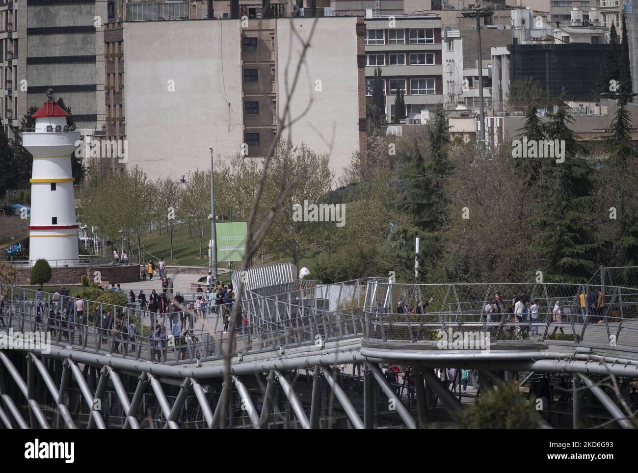 Iranian people walk on the Nature Bridge in northern Tehran during the ...