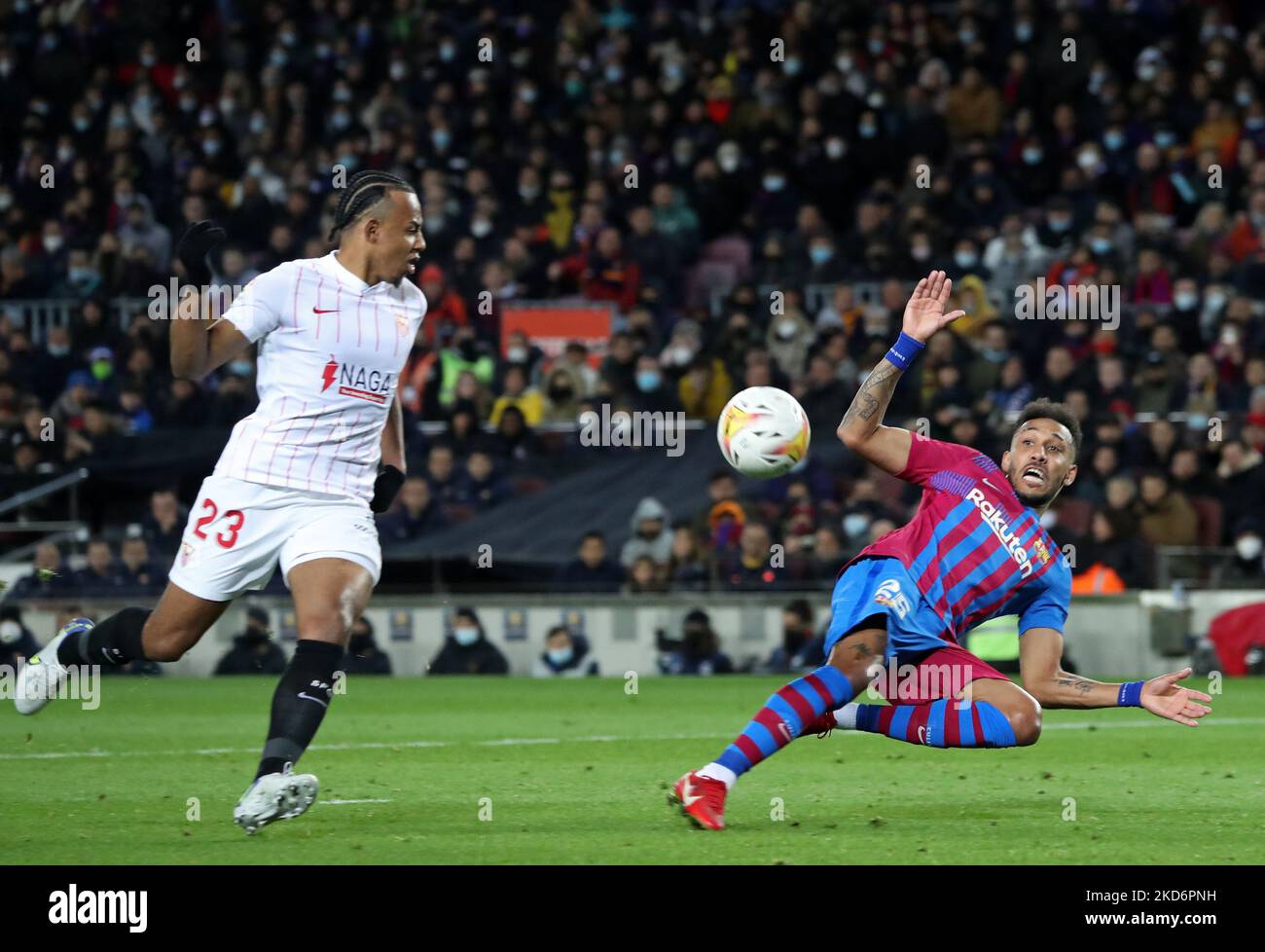 Pierre Emerick Aubameyang and Jules Kounde during the match between FC Barcelona and Sevilla FC, corresponding to the week 30 of the Liga Santander, played at the Camp Nou Stadium, in Barcelona, on 03th April 2022. (Photo by Joan Valls/Urbanandsport /NurPhoto) Stock Photo