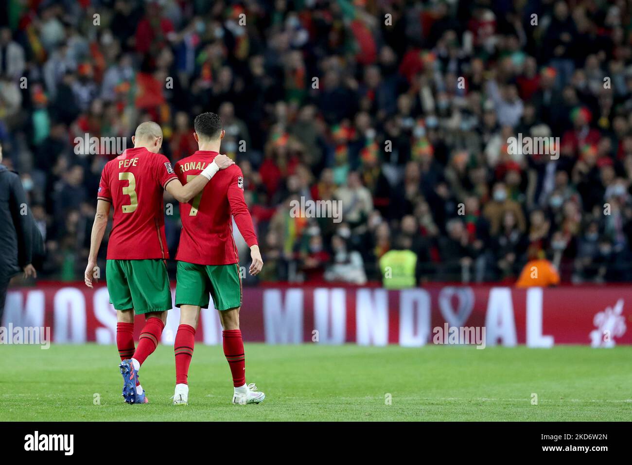 Portugal's forward Cristiano Ronaldo (R ) and Pepe celebrate the victory at the end of the 2022 FIFA World Cup Qualifier football match between Portugal and North Macedonia at the Dragao stadium in Porto, Portugal, on March 29, 2022. (Photo by Pedro FiÃºza/NurPhoto) Stock Photo