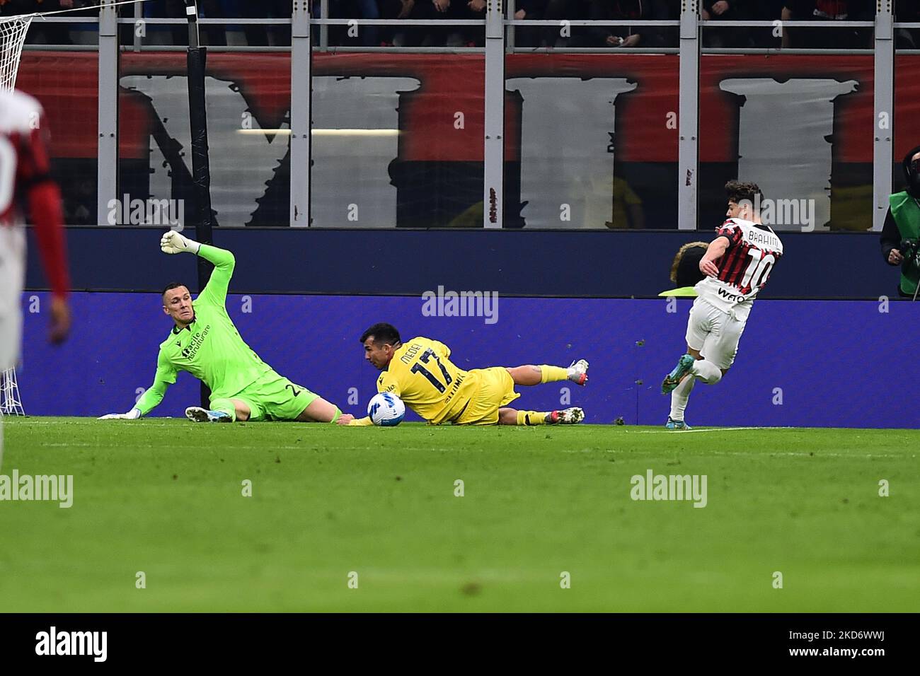 Gary Medel of Bologna F.C. saves the shot of Brahim Diaz of A.C. Milan during the Italian Serie A soccer match between A.C. Milan vs Bologna F.C. at the San Siro Stadium in Milan, Italy on 4 April 2022. (Photo by Michele Maraviglia/NurPhoto) Stock Photo