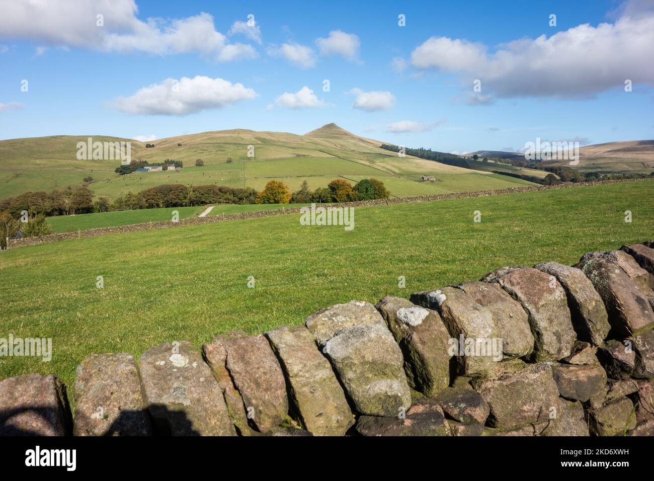 Shutlingsloe hill viewed over dry stone wall near the village of ...