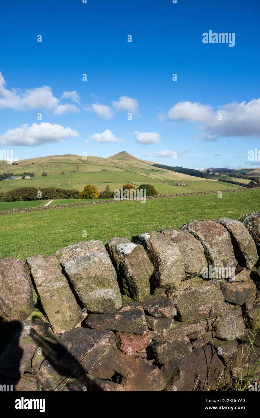 Shutlingsloe hill viewed over dry stone wall near the village of ...