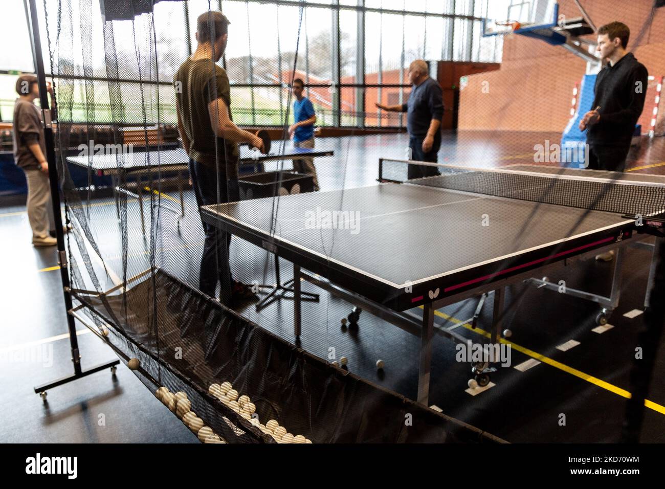 Ukrainian youth attend table tenis training run by a trainer Krzysztof in  KS Cracovia sports hall in Krakow, Poland on April 6, 2022 . The conflict  between Ukraine and Russia is expected