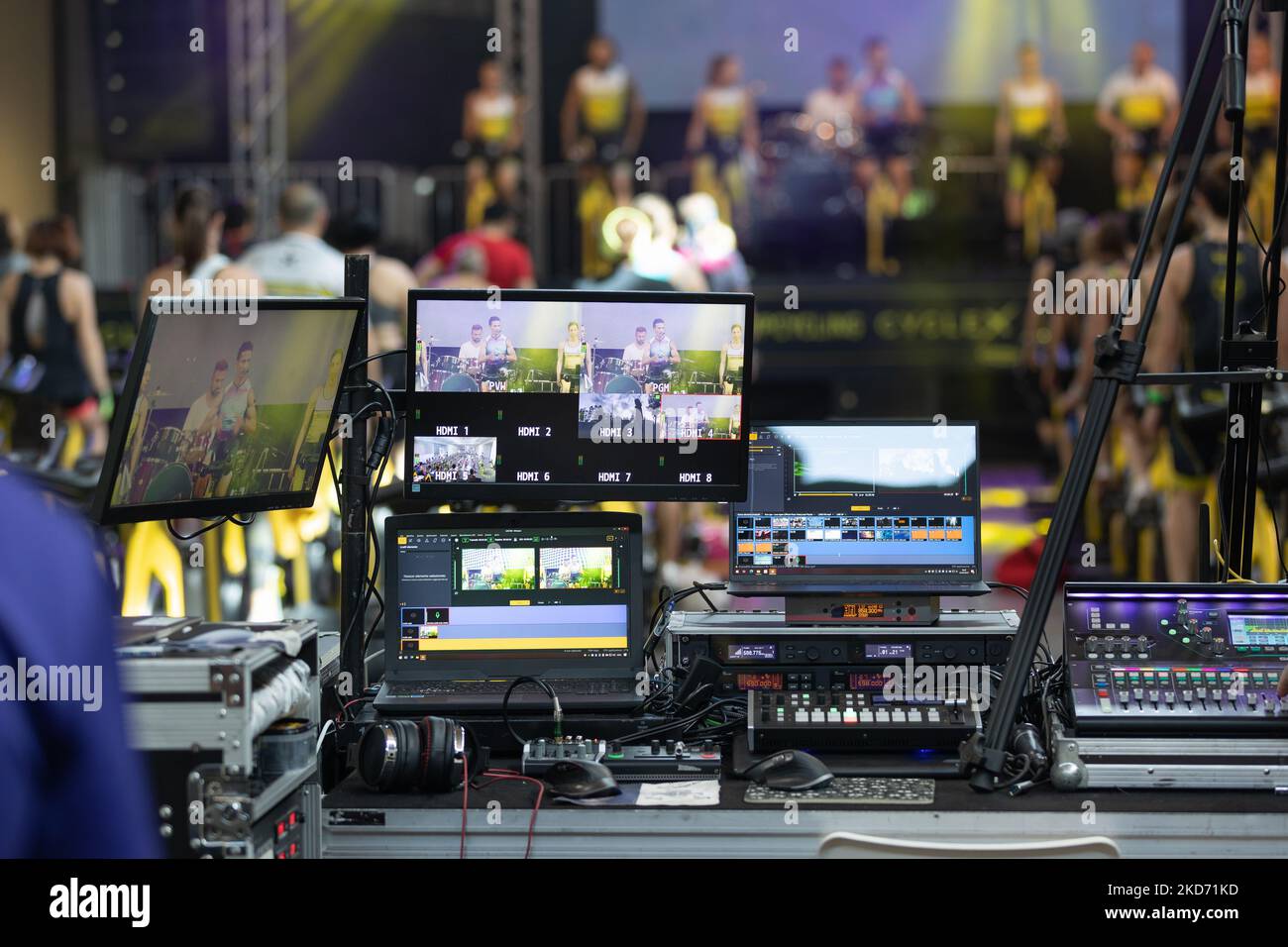 Broadcast technicians work at computer hires stock photography and