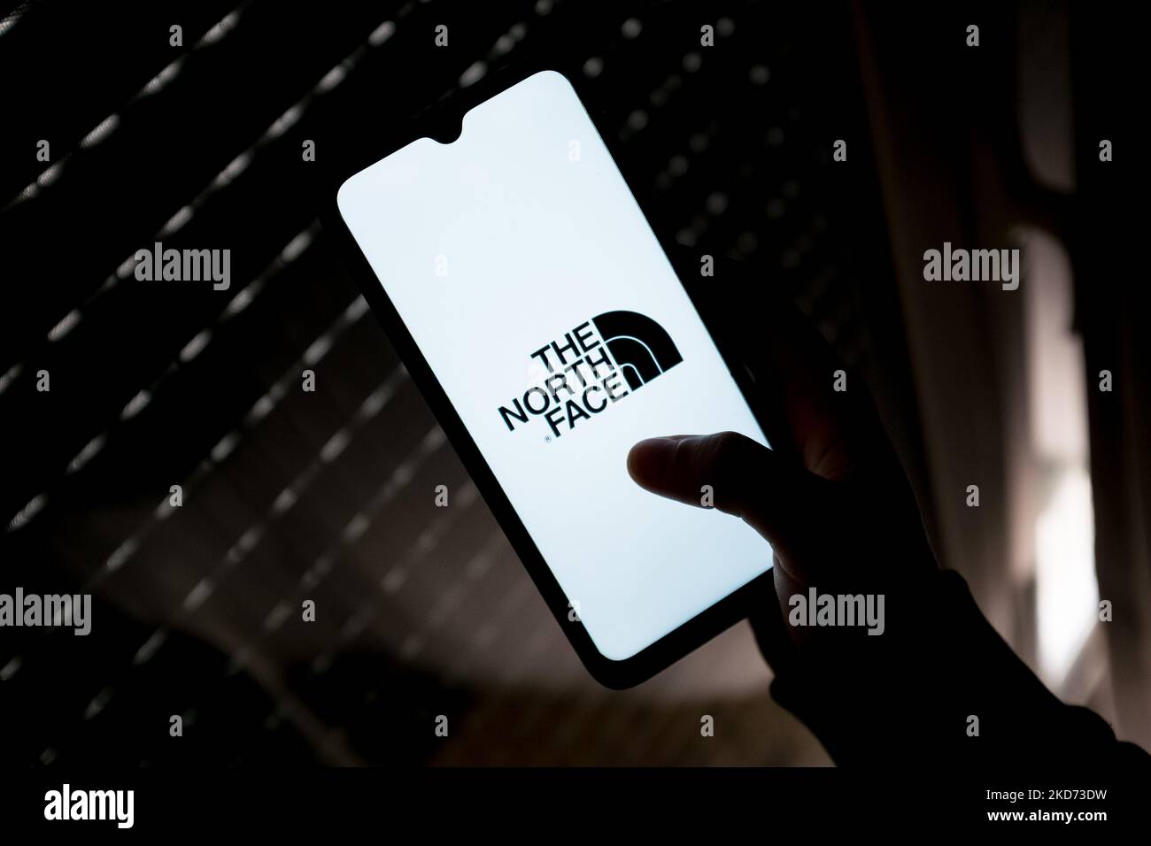 In this photo illustration a The North Face logo seen displayed on a smartphone screen in Athens, Greece on April 7, 2022. (Photo illustration by Nikolas Kokovlis/NurPhoto) Stock Photo