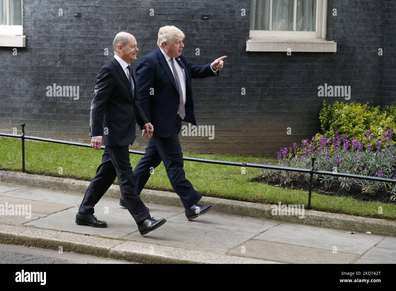 German Chancellor Olaf Scholz (left) and British Prime Minister Boris Johnson (right) walk to a joint press conference on Downing Street in London, England, on April 8, 2022. (Photo by David Cliff/NurPhoto) Stock Photo