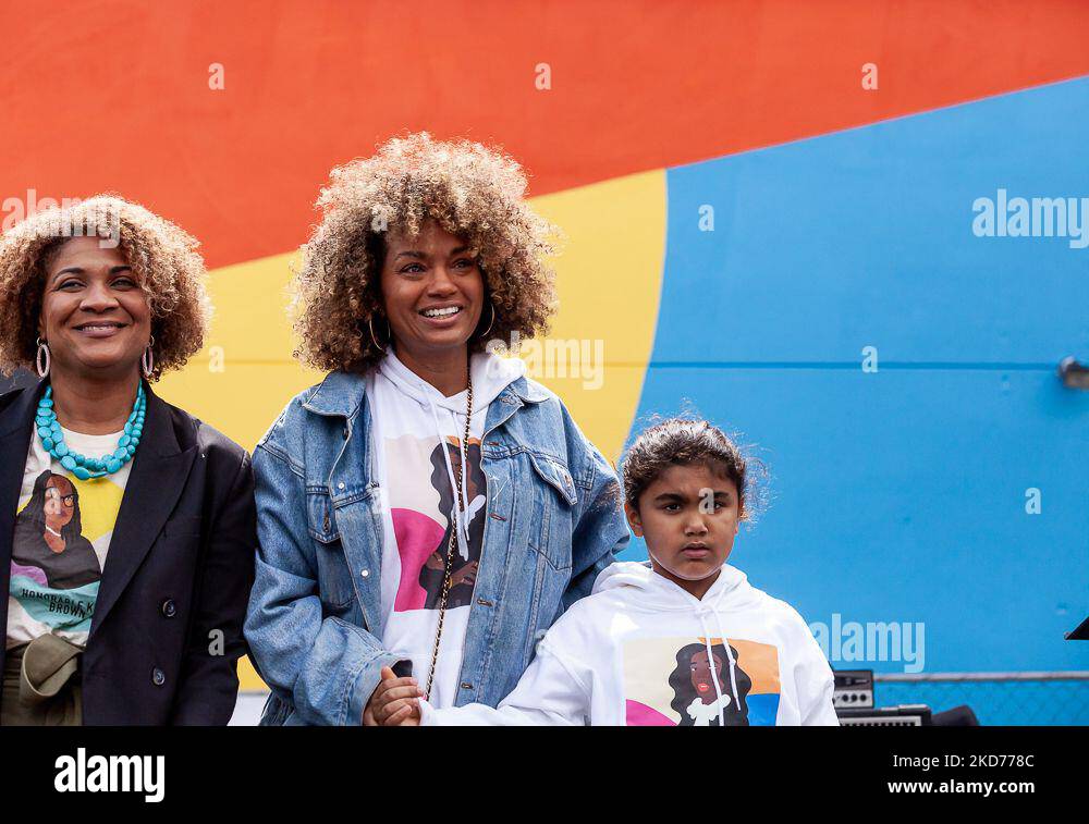 Fatima Goss Graves (left), Kim Tignor (center), and Tignor’s daughter, Nadia, celebrate the historic confirmation of Ketanji Brown Jackson to the Supreme Court during a block party in Washington, DC. Goss Graves is the president and CEO of the National Women’s Law Center, and Tignor is one of the co-founders of She Will Rise, one of the organizations pushing hardest for representation of Black women on the Supreme Court and federal judiciary. Justice Jackson will be the first Black woman and public defender to sit on the Court. The Senate voted 53-47 to confirm her on April 7, 2022. (Photo by  Stock Photo