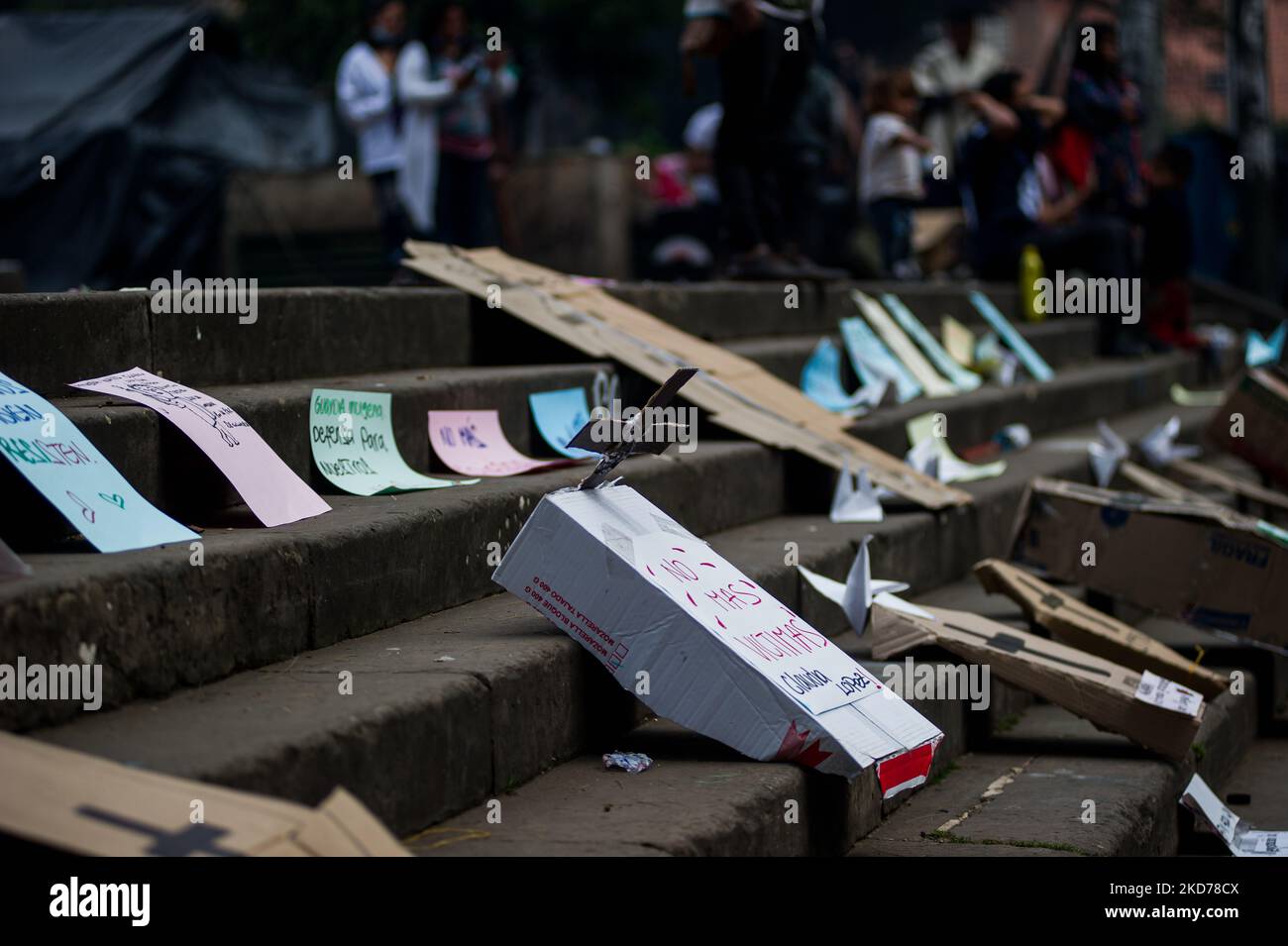 A sign with a carboard coffin that reads 'No more victims Mayor Claudia Lopez' as Embera indigenous communities that camp at Bogota's National Park protest against violence in Colombia during the commemoration of april 9th 'Bogotazo' that marked the beginning of one of Colombia's most violent eras. In Bogota, Colombia, April 9, 2022. (Photo by Sebastian Barros/NurPhoto) Stock Photo