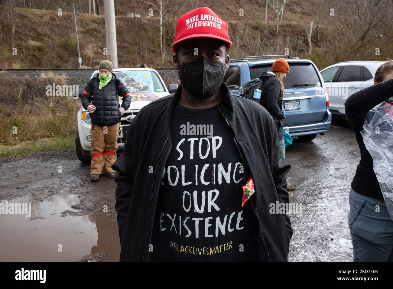Climate activists gather to block the entrance to the Grant Town Power