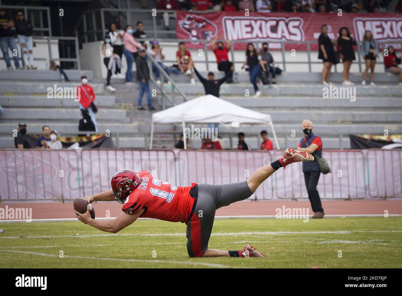 Brandon Lopez (Mexicas) scores a touchdown during the 5th round match between Mexicas and Gallos
