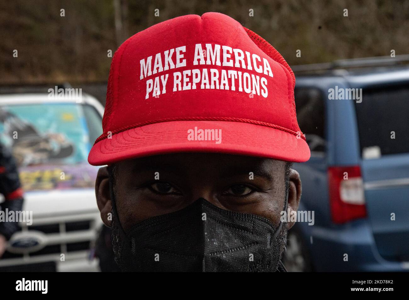 Climate activists gather to block the entrance to the Grant Town Power