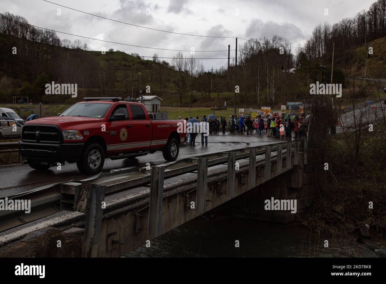 Climate activists gather to block the entrance to the Grant Town Power