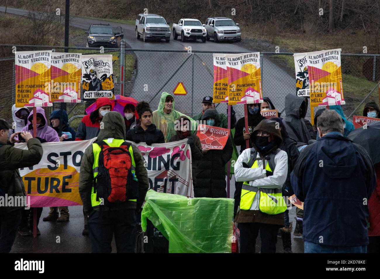 Climate activists gather to block the entrance to the Grant Town Power