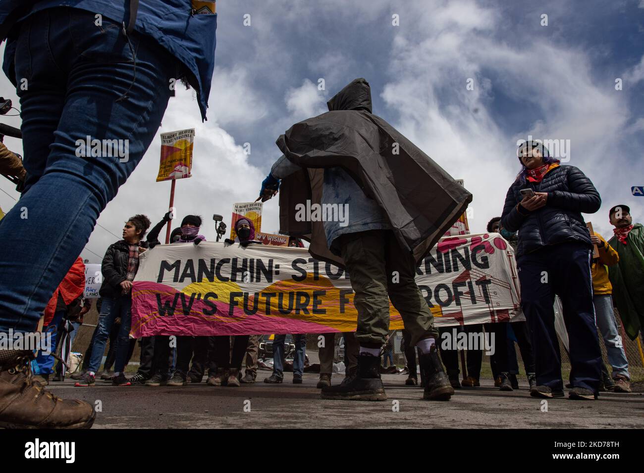 Climate activists gather to block the entrance to the Grant Town Power