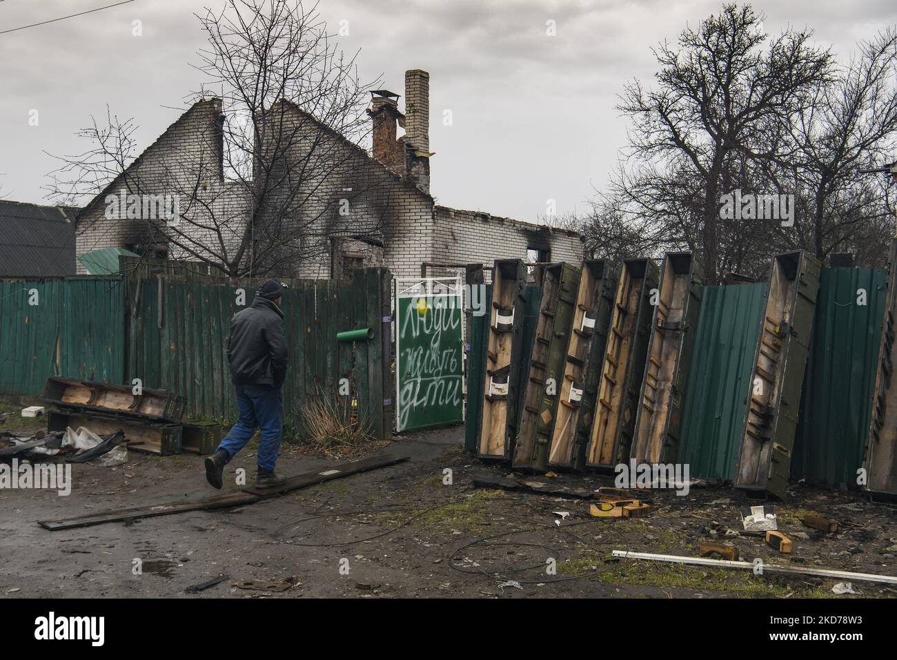 Boxes from ammunition next to Residential houses Destroyed by Russian army in the recaptured by the Ukrainian army Andriivka village, Kyiv region, Ukraine, April 09, 2022 (Photo by Maxym Marusenko/NurPhoto) Stock Photo