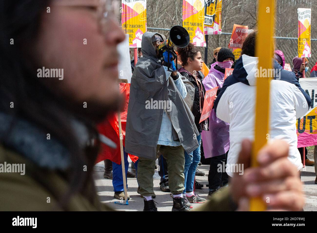 Climate activists gather to block the entrance to the Grant Town Power