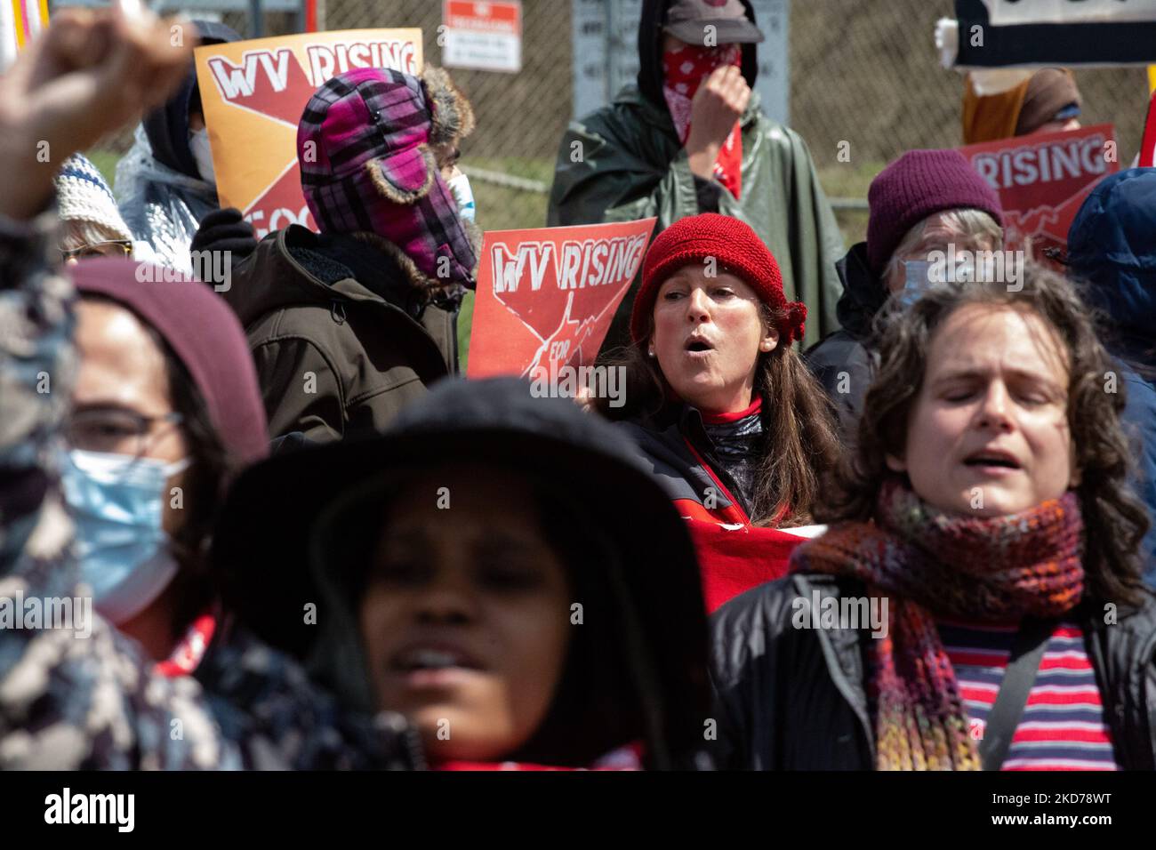 Climate activists gather to block the entrance to the Grant Town Power
