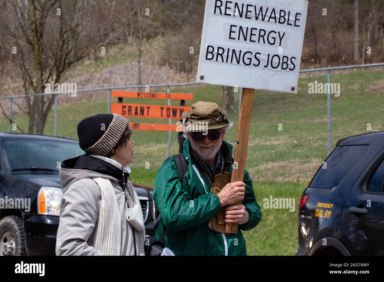 Climate activists gather to block the entrance to the Grant Town Power