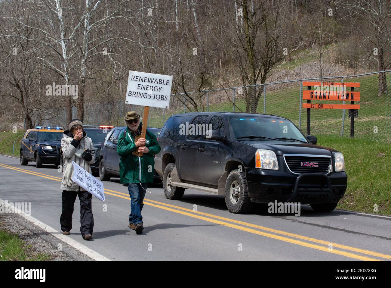 Climate activists gather to block the entrance to the Grant Town Power