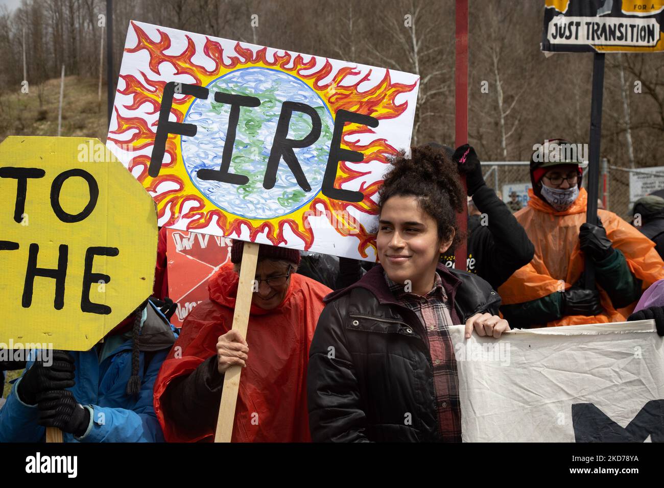 Climate activists gather to block the entrance to the Grant Town Power
