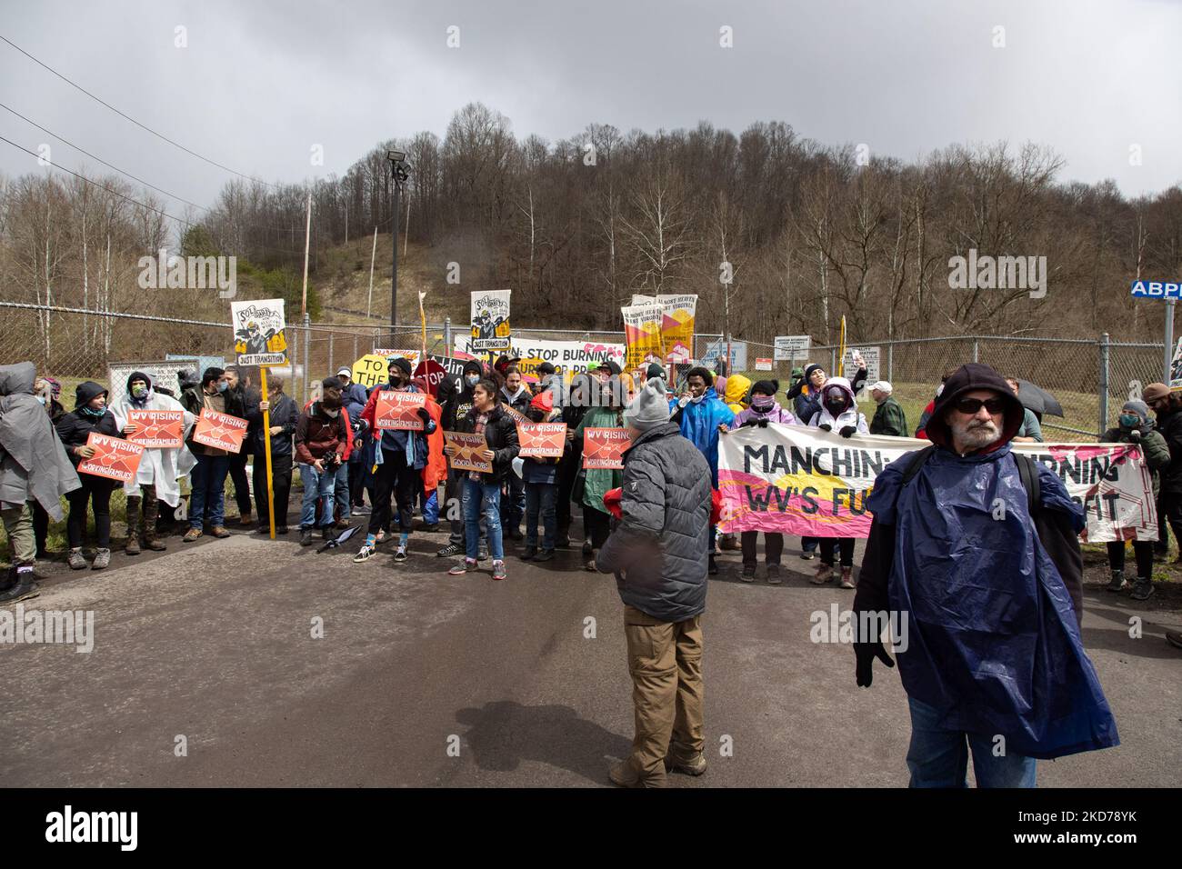 Climate activists gather to block the entrance to the Grant Town Power