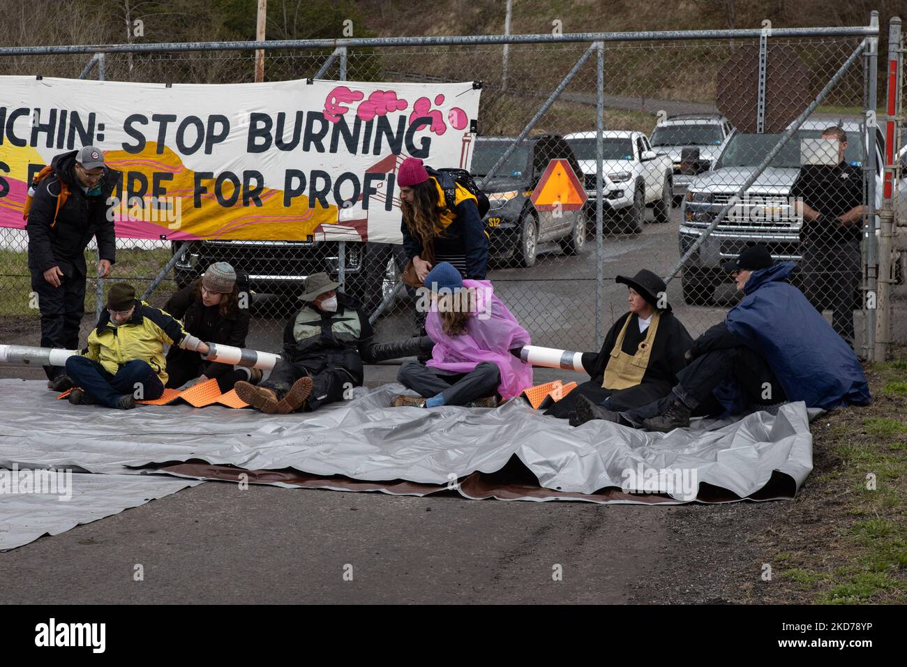 Climate activists gather to block the entrance to the Grant Town Power