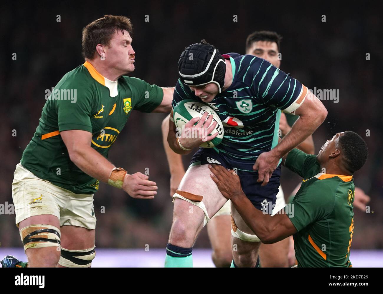Ireland's James Ryan tackled by South Africa's Jasper Wiese and South Africa's Damian Willemse during the Autumn International match at the Aviva Stadium, Dublin. Picture date: Saturday November 5, 2022. Stock Photo