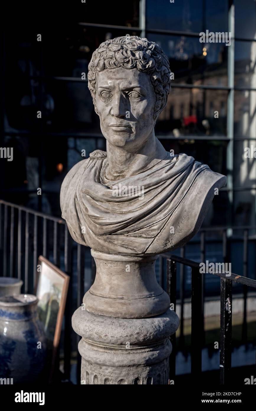 Bust of a man, possibly Roman, on display outside an antique shop on Dundas Street in Edinburgh's New Town. Stock Photo