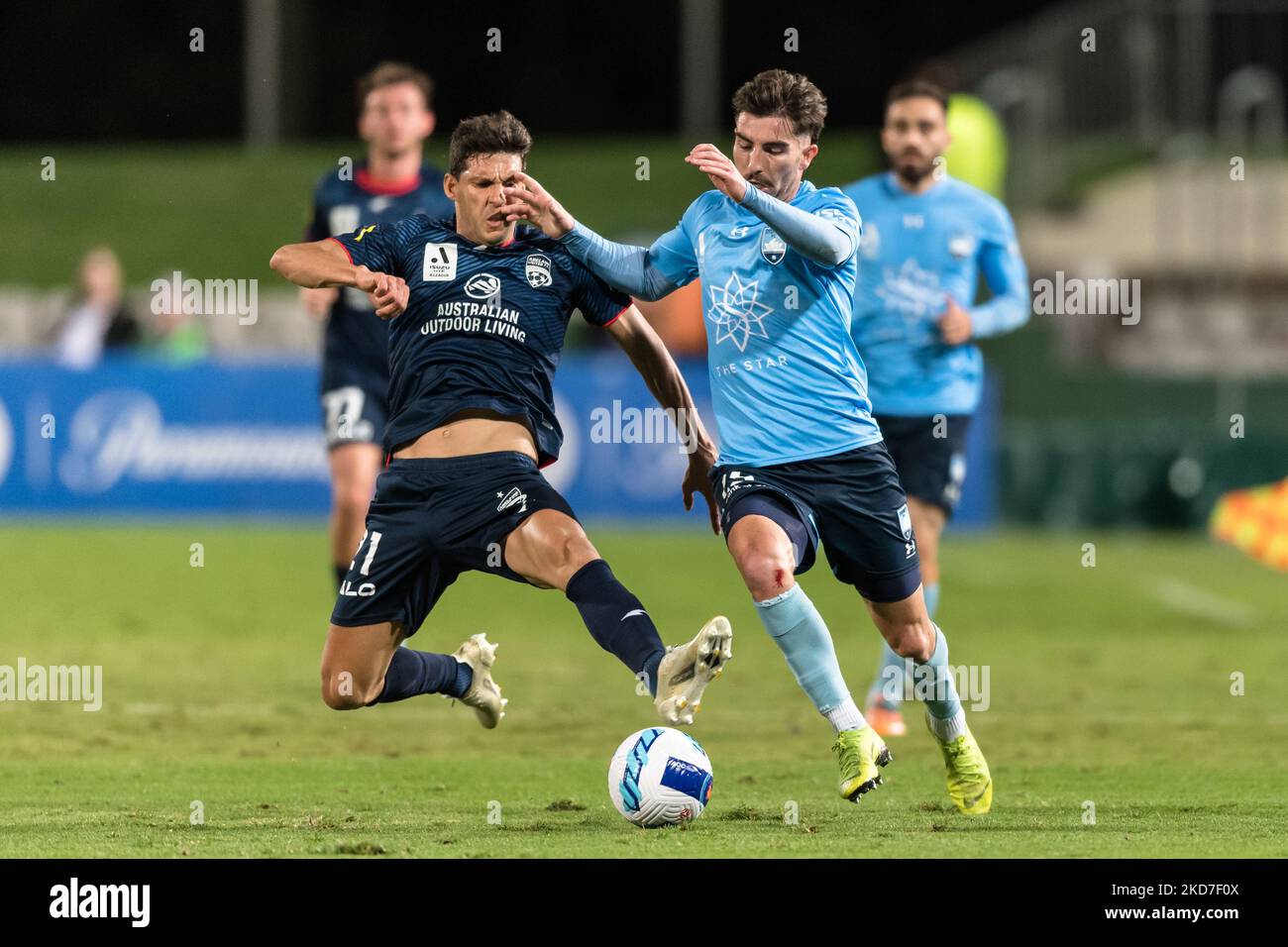 Callum Talbot of Sydney FC and Javier Lopez of Adelaide United F.C. compete for the ball during the A-League match between Sydney FC and Adelaide United FC at Netstrata Jubilee Stadium, on April 12, 2022, in Sydney, Australia. Stock Photo