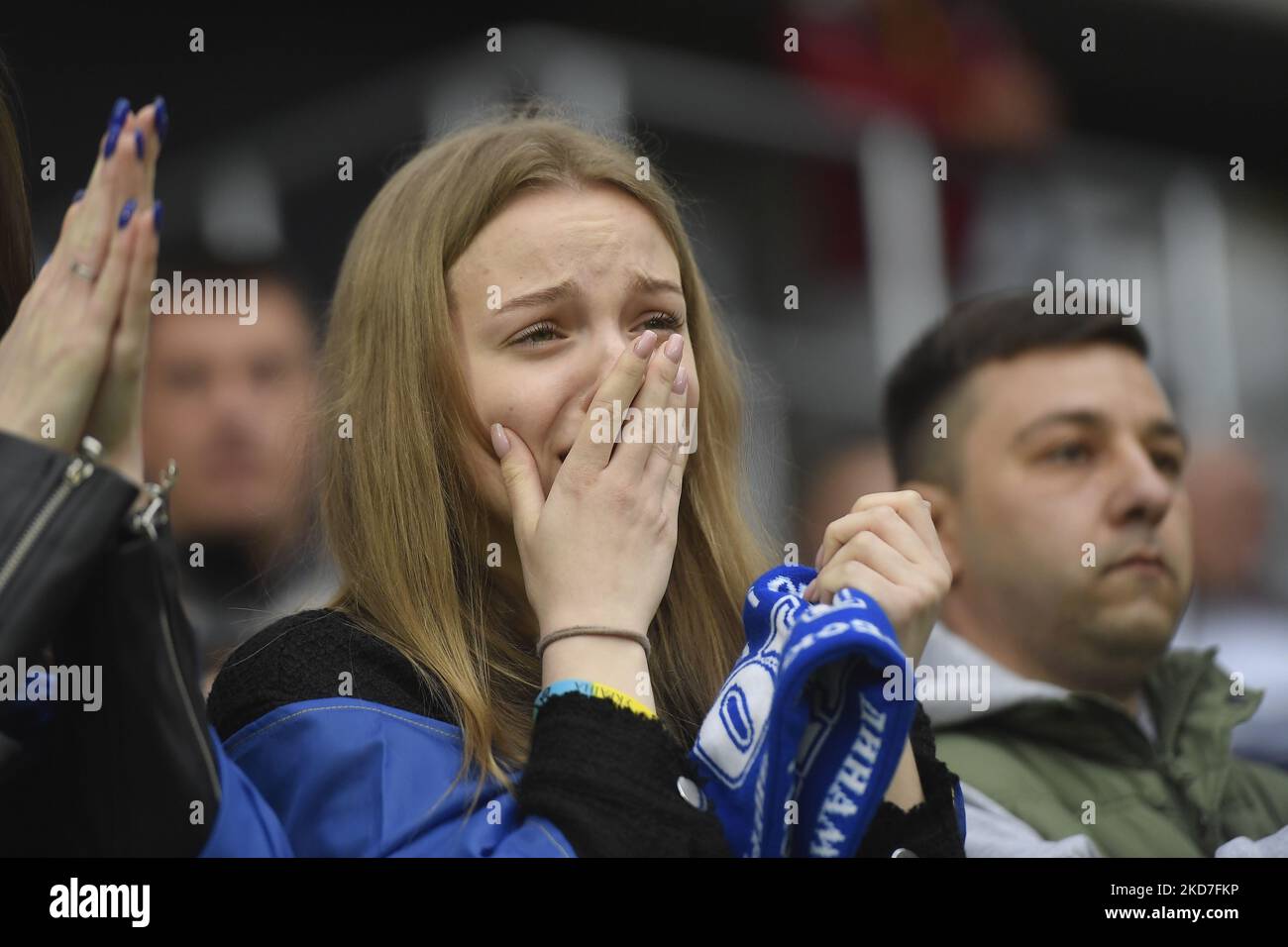 A fan cries during the UEFA Youth League Round of Sixteen match between Dynamo Kyiv and Sporting CP at Rapid-Giulesti Stadium on April 7, 2022 in Bucharest, Romania. (Photo by Alex Nicodim/NurPhoto) Stock Photo