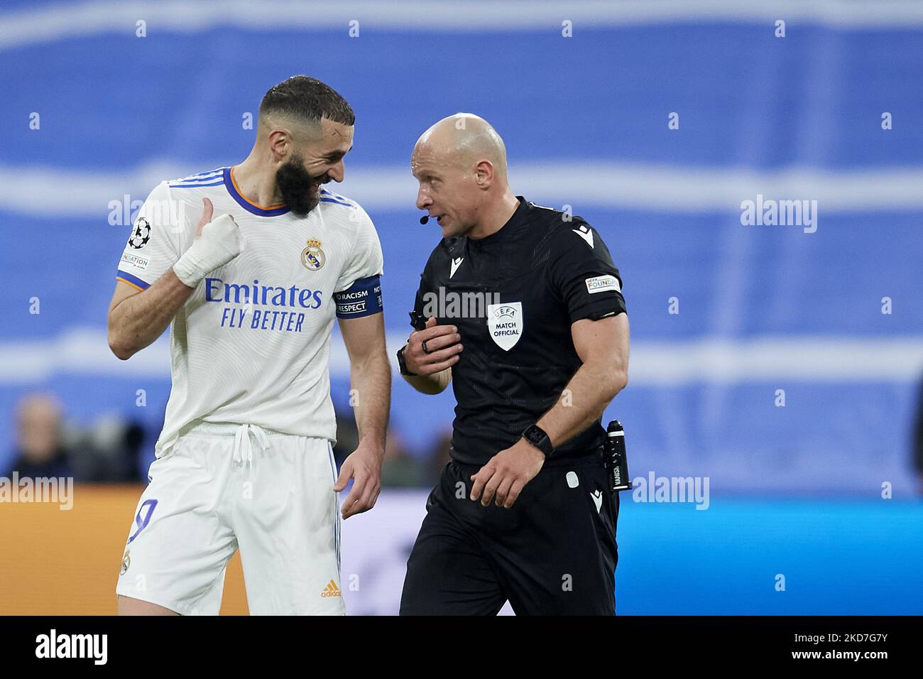 Karim Benzema of Real Madrid and referee Szymon Marciniak talk during the UEFA Champions League Quarter Final Leg Two match between Real Madrid and Chelsea FC at Estadio Santiago Bernabeu on April 12, 2022 in Madrid, Spain. (Photo by Jose Breton/Pics Action/NurPhoto) Stock Photo