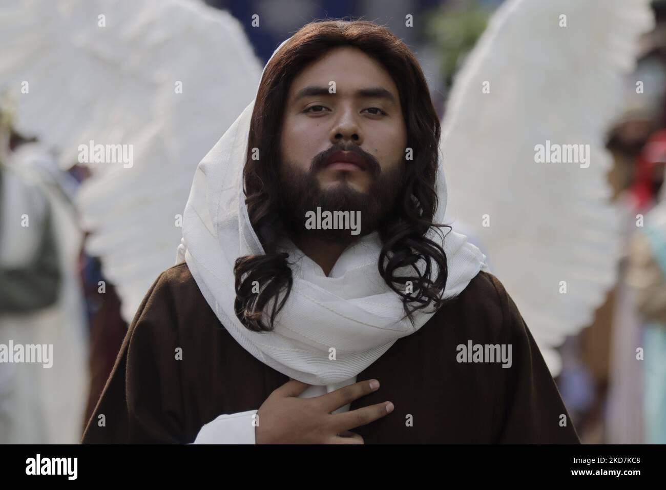 A young man from San Francisco Culhuacán, in Coyoacán, Mexico City, dressed as Jesus Christ for the Holy Thursday of Holy Week and the Passion of Christ re-enactment, during a procession that includes the Stations of the Cross on Good Friday and concludes with Easter. (Photo by Gerardo Vieyra/NurPhoto) Stock Photo