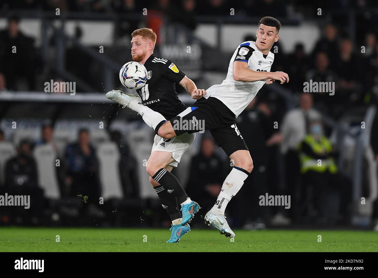 Harrison Reed of Fulham battles with Tom Lawrence of Derby County during the Sky Bet Championship match between Derby County and Fulham at the Pride Park, Derby on Friday 15th April 2022. (Photo by Jon Hobley/MI News/NurPhoto) Stock Photo