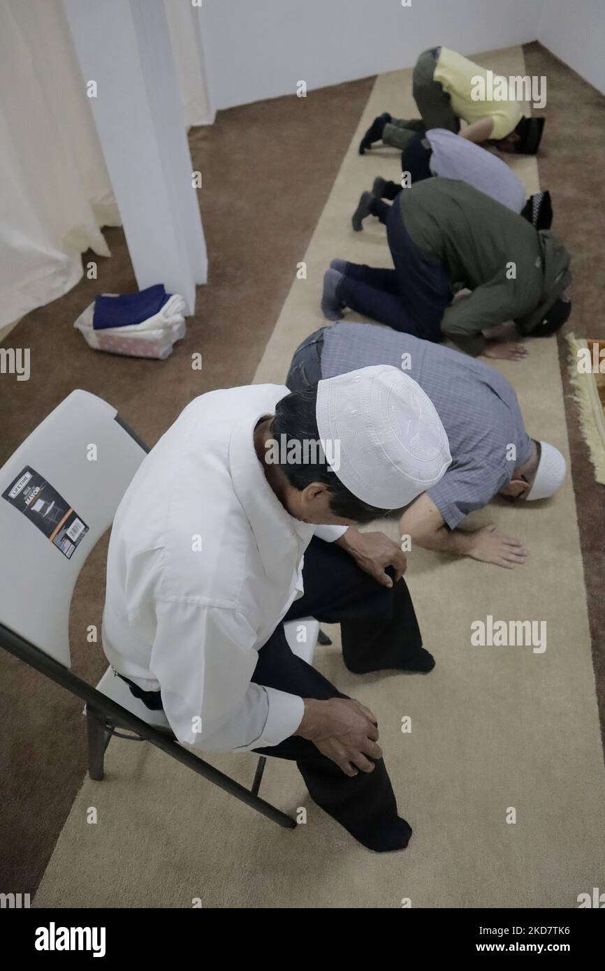 Members of the Muslim community inside a mosque in Mexico City, during prayer after fasting as part of Ramadan in order to grow spiritually and establish stronger relationships with Allah. (Photo by Gerardo Vieyra/NurPhoto) Stock Photo