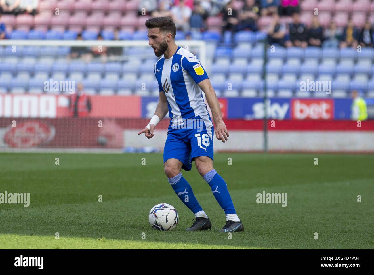 midfielder Graeme Shinnie (18)of Wigan Athletic during the Sky Bet League 1 match between Wigan Athletic and Cambridge United at the DW Stadium, Wigan on Saturday 16th April 2022. (Photo by Mike Morese/MI News/NurPhoto) Stock Photo