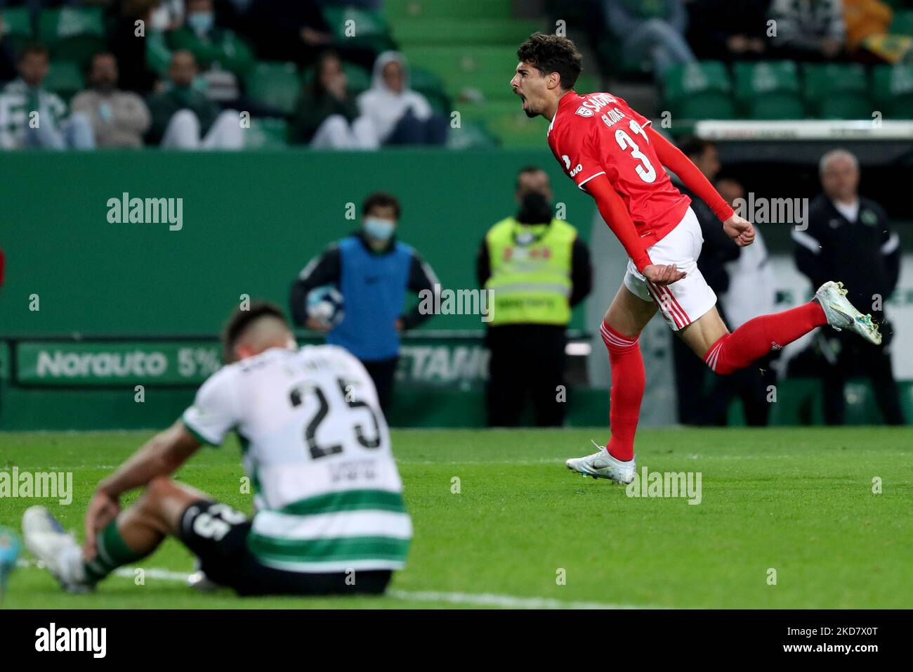 Gil Dias of SL Benfica (R ) celebrates after scoring a goal during the Portuguese League football match between Sporting CP and SL Benfica at Jose Alvalade stadium in Lisbon, Portugal on April 17, 2022. (Photo by Pedro FiÃºza/NurPhoto) Stock Photo